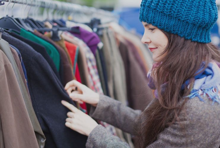 Woman Going through Clothes Woman Going through Clothes